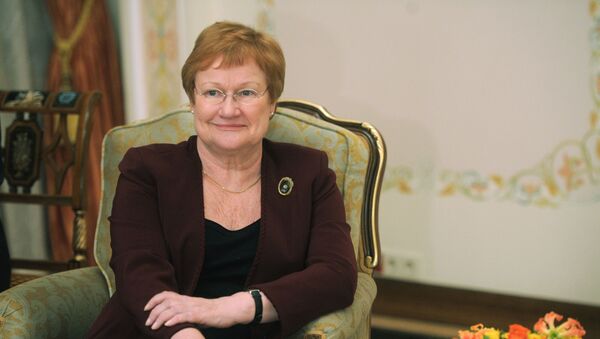 Finnish President Tarja Halonen meets with Russian Prime Minister Vladimir Putin, unseen in the photo, in the Novo-Ogaryovo residence outside Moscow, Tuesday, Jan. 17, 2012. - Sputnik International