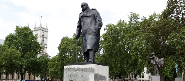 A council employee cleans graffiti from the statue of Winston Churchill at Parliament Square, in the aftermath of protests against the death of George Floyd who died in police custody in Minneapolis, London, Britain, June 8, 2020.  - Sputnik International