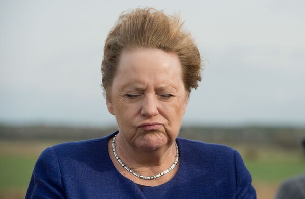  Канцлер Германии Ангела Меркель на сильном ветру, 2019 год - Sputnik International