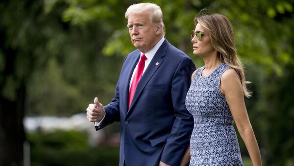 President Donald Trump and first lady Melania Trump walk across the South Lawn of the White House in Washington, Wednesday, May 27, 2020 - Sputnik International