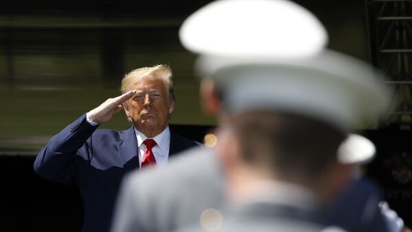 President Donald Trump salutes after speaking to over 1,110 cadets in the Class of 2020 at a commencement ceremony on the parade field, at the United States Military Academy in West Point, N.Y., Saturday, June 13, 2020 - Sputnik International