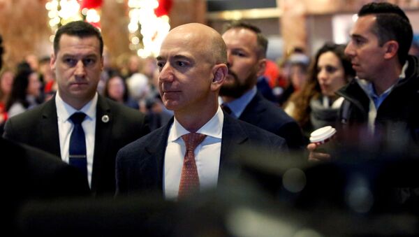  Jeff Bezos, founder, chairman, and chief executive officer of Amazon.com enters Trump Tower ahead of a meeting of technology leaders with President-elect Donald Trump in Manhattan, New York City, U.S., December 14, 2016.  - Sputnik International