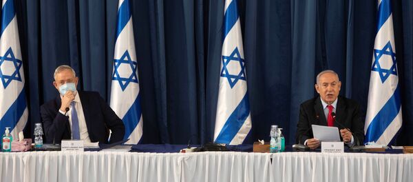 Israeli Prime Minister Benjamin Netanyahu and Israeli Defense Minister Benny Gantz attend the weekly cabinet meeting at the Ministry of Foreign Affairs in Jerusalem, June 14, 2020 Israeli Prime Minister Benjamin Netanyahu and Israeli Defense Minister Benny Gantz attend the weekly cabinet meeting at the Ministry of Foreign Affairs in Jerusalem, June 14, 2020 - Sputnik International