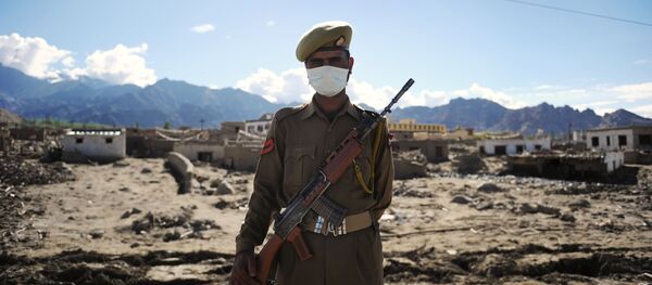 An Indian armed forces serviceman stands guard (File) An Indian armed forces serviceman stands guard (File) - Sputnik International