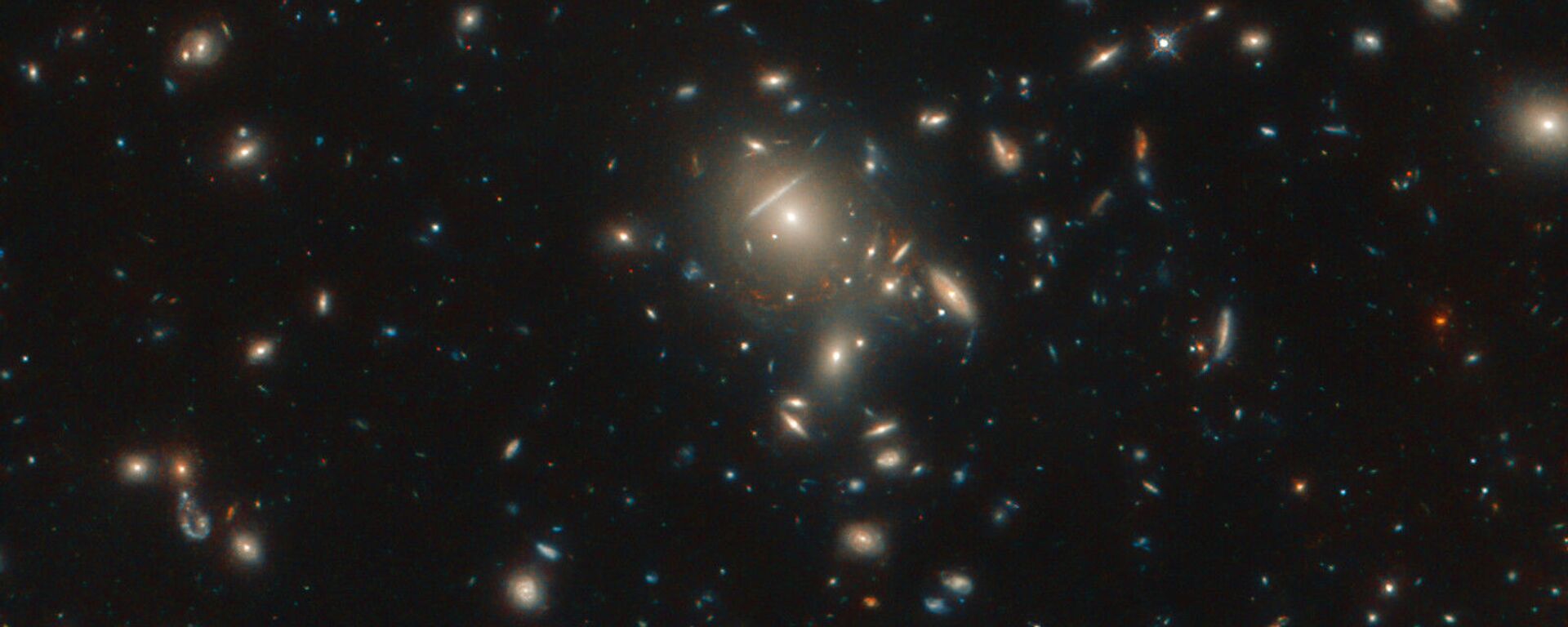 Seen here in incredible detail, thanks to the NASA/ESA Hubble Space Telescope, is the starburst galaxy formally known as PLCK G045.1+61.1. - Sputnik International, 1920, 16.05.2021