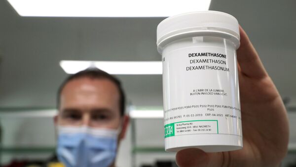 A pharmacist displays a box of Dexamethasone at the Erasme Hospital amid the coronavirus disease (COVID-19) outbreak, in Brussels, Belgium, June 16, 2020. REUTERS/Yves Herman - Sputnik International