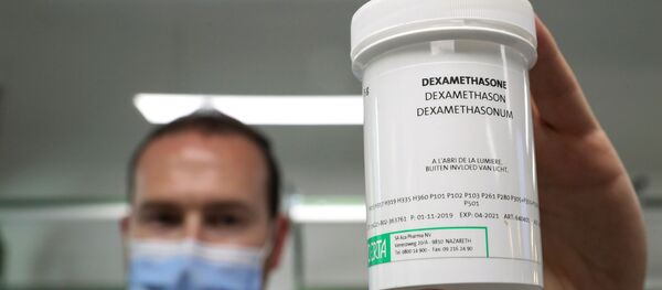 A pharmacist displays a box of Dexamethasone at the Erasme Hospital amid the coronavirus disease (COVID-19) outbreak, in Brussels, Belgium, June 16, 2020. REUTERS/Yves Herman - Sputnik International