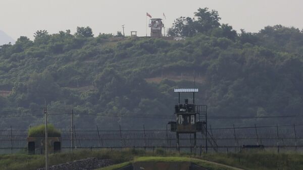 Military guard posts of North Korea, rear, and South Korea, foreground, are seen in Paju, at the border with North Korea, South Korea, Tuesday, June 16, 2020 - Sputnik International