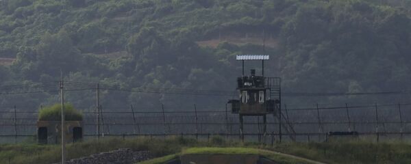 Military guard posts of North Korea, rear, and South Korea, foreground, are seen in Paju, at the border with North Korea, South Korea, Tuesday, June 16, 2020 - Sputnik International