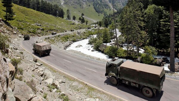 Indian army trucks move along a highway leading to Ladakh, at Gagangeer in Kashmir's Ganderbal district, 17 June 2020 - Sputnik International