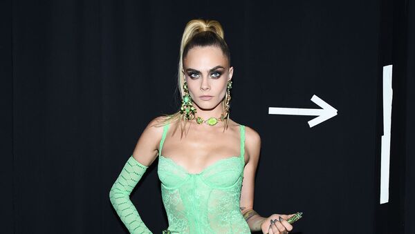 Cara Delevigne prepares backstage for Savage X Fenty Show Presented By Amazon Prime Video - Backstage at Barclays Center on September 10, 2019 in Brooklyn, New York - Sputnik International