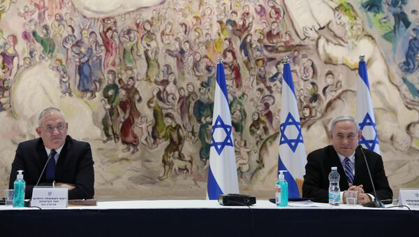 Israeli Prime Minister Benjamin Netanyahu and Defense Minister Benny Gantz attend a cabinet meeting of the new government at the Chagall Hall in the Knesset, the Israeli Parliament in Jerusalem May 24, 2020.  - Sputnik International