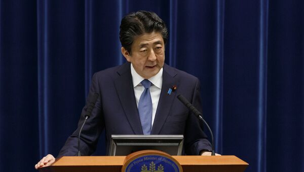 Japan's Prime Minister Shinzo Abe speaks during a press conference at his official residence in Tokyo on June 18, 2020.  - Sputnik International