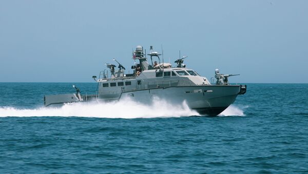 A Mark VI patrol boat participates in the bilateral Mine Countermeasures Exercise 2020 (MCMEX 20) with the mine countermeasures ship USS Gladiator (MCM 11) in the Arabian Gulf, March 28. Gladiator is forward-deployed to the U.S. 5th Fleet area of operations in support of naval operations to ensure maritime stability and security in the Central region, connecting the Mediterranean and the Pacific through the Western Indian Ocean and three strategic choke points - Sputnik International