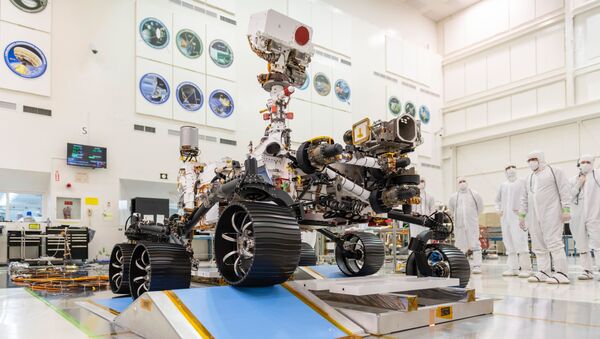 In a clean room at NASA's Jet Propulsion Laboratory in Pasadena, California, engineers observe the first driving test for NASA's Mars 2020 rover (Perseverance) on 17 December 2019. - Sputnik International