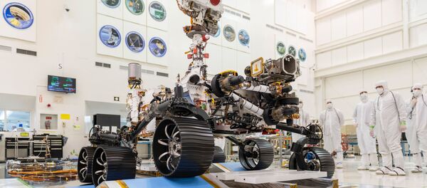 In a clean room at NASA's Jet Propulsion Laboratory in Pasadena, California, engineers observe the first driving test for NASA's Mars 2020 rover (Perseverance) on 17 December 2019. - Sputnik International