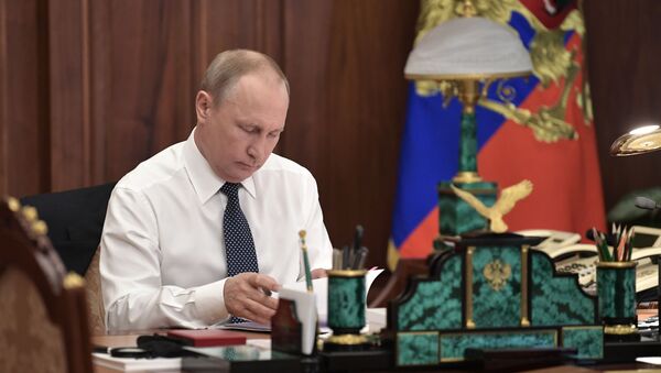 May 7, 2018. Russian President-elect Vladimir Putin in his office before the inaugural ceremony in the Kremlin - Sputnik International