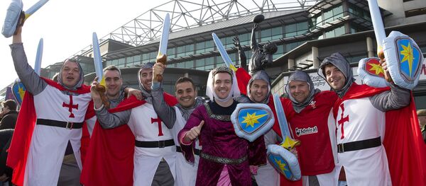 English rugby fans pose for a photograph ahead of the Six Nations international rugby union match between England and Wales at Twickenham in south west London on March 12, 2016 - Sputnik International