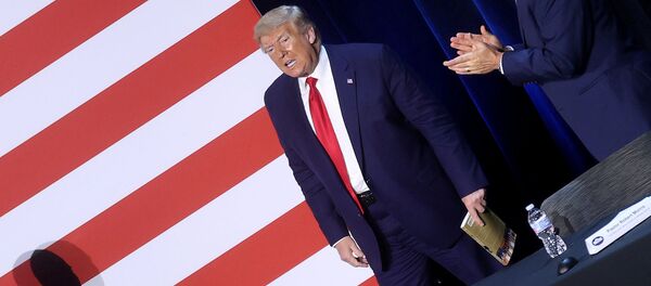 U.S. President Donald Trump is applauded by participants after a roundtable discussion with supporters and civic leaders at Gateway Church in Dallas, Texas, U.S. June 11, 2020. - Sputnik International