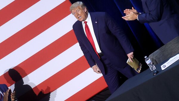 US President Donald Trump is applauded by participants after a round table discussion with supporters and civic leaders at Gateway Church in Dallas, Texas, 11 June 2020. - Sputnik International