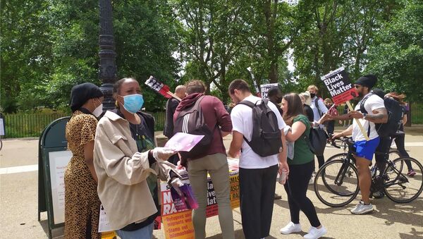Members of the Socialist Worker handing out leaflets as part of the protest organised by groups operating under the BLM theme - Sputnik International