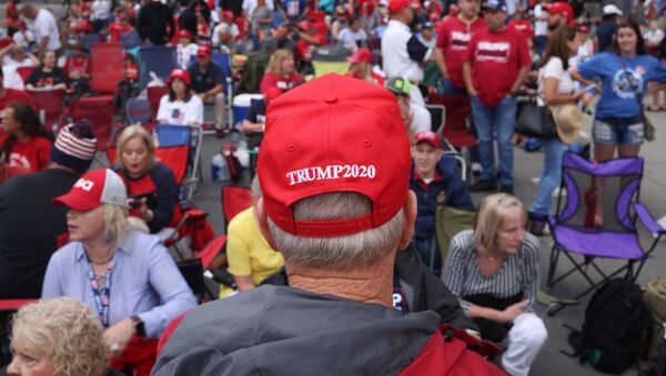 Supporters of U.S. President Donald Trump gather to attend a campaign rally at the BOK Center, June 20, 2020 in Tulsa, Oklahoma. President Trump is scheduled to hold his first political rally since the start of the coronavirus pandemic at the BOK Center on Saturday while infection rates in the state of Oklahoma continue to rise - Sputnik International