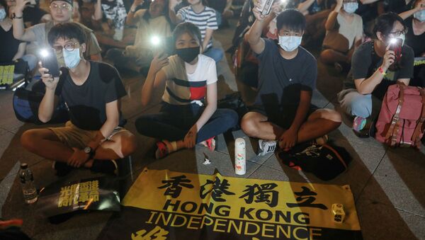 Supporters of Hong Kong anti-government movement gather at Liberty Square, to mark the one-year anniversary of the start of the protests in Hong Kong, in Taipei, Taiwan, June 13, 2020. - Sputnik International