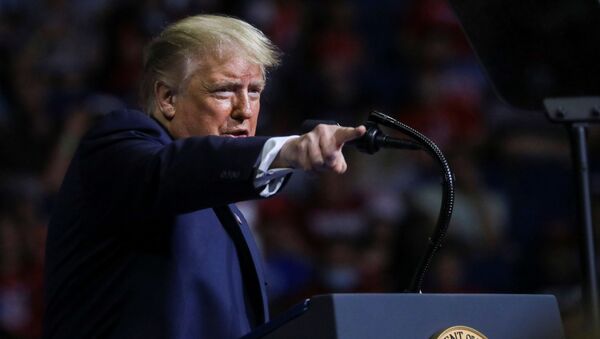U.S. President Donald Trump points into the crowd as he speaks during his first re-election campaign rally in several months in the midst of the coronavirus disease (COVID-19) outbreak, at the BOK Center in Tulsa, Oklahoma, U.S., June 20, 2020.  - Sputnik International