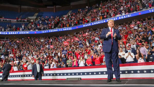 U.S. President Donald Trump reacts to the crowd as he arrives onstage at his first re-election campaign rally in several months in the midst of the coronavirus disease (COVID-19) outbreak, at the BOK Center in Tulsa, Oklahoma, U.S., June 20, 2020. - Sputnik International