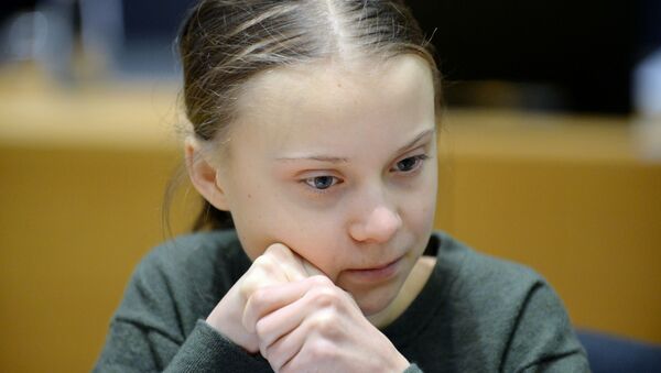  Swedish climate activist Greta Thunberg looks on before the meeting with EU environment ministers in Brussels, Belgium, March 5, 2020 - Sputnik International
