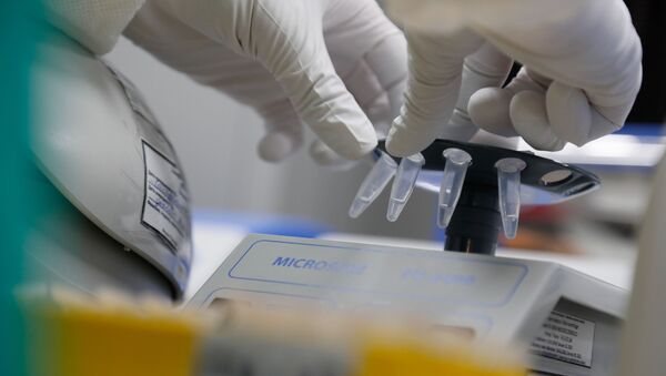 A scientist conducts sample​ sedimentation during the research and development of a vaccine against the coronavirus disease (COVID-19) at a laboratory of BIOCAD biotechnology company in Saint Petersburg, Russia June 11, 2020. - Sputnik International