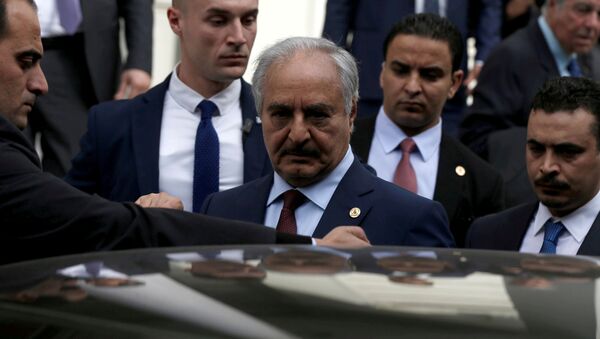  Libyan commander Khalifa Haftar gets into a car after a meeting with Greek Foreign Minister Nikos Dendias at the Foreign Ministry in Athens, Greece, January 17, 2020 - Sputnik International