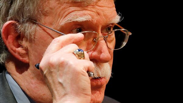 Former U.S. national security adviser John Bolton adjusts his glasses during his lecture at Duke University in Durham, North Carolina, U.S. February 17, 2020 - Sputnik International
