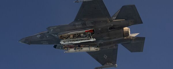 An F-35A releases ordnance during a dual capable aircraft (DCA) test flight in the skies above Edwards Air Force Base, California, on October 22, 2019. An F-35A releases ordnance during a dual capable aircraft (DCA) test flight in the skies above Edwards Air Force Base, California, on October 22, 2019. - Sputnik International