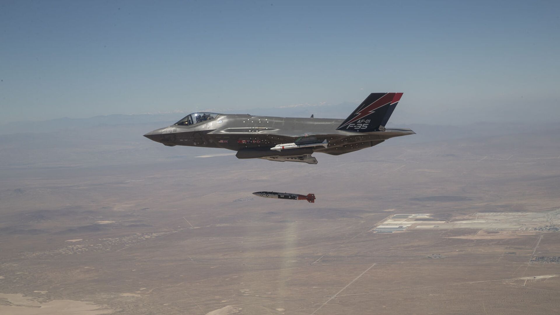 An F-35A releases ordnance during a dual capable aircraft (DCA) test flight in the skies above Edwards Air Force Base, California, on June 27, 2019. - Sputnik International, 1920, 15.09.2023