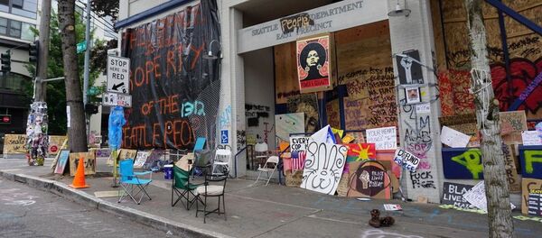 Seattle Police Department East Precinct amid protests against police brutality in June 2020 Seattle Police Department East Precinct amid protests against police brutality in June 2020 - Sputnik International