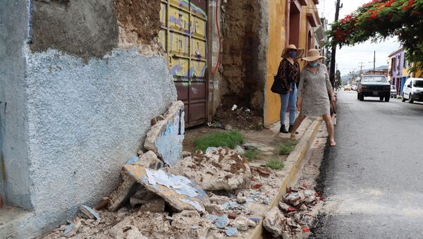 Building damaged during a quake in Oaxaca - Sputnik International