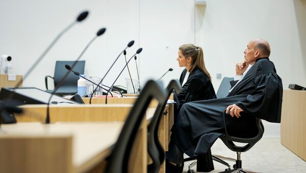 Sabine ten Doesschate and Boudewijn van Eijck, lawyers of defendant Oleg Pulatov are seen in a courtroom of The Schiphol Judicial Complex, prior to the criminal trial against four suspects in the July 2014 downing of Malaysia Airlines flight MH17, in Badhoevedorp, Netherlands, June 8, 2020.  - Sputnik International