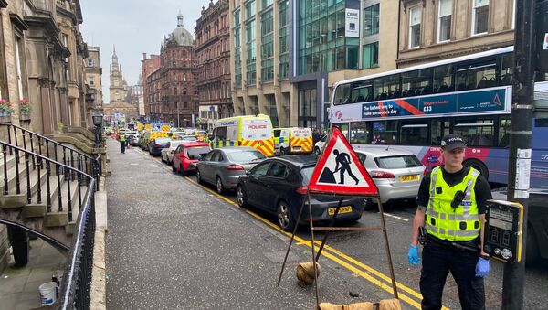 Emergency respoders are seen near a scene of reported stabbings, in Glasgow, Scotland, Britain June 26, 2020, in this picture obtained from social media - Sputnik International