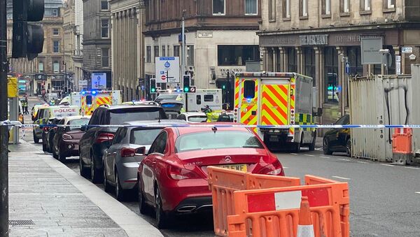 Emergency respoders are seen near a scene of reported stabbings, in Glasgow, Scotland, Britain June 26, 2020, in this picture obtained from social media - Sputnik International