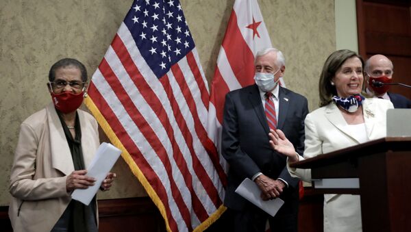 House Speaker Nancy Pelosi (D-CA) recognizes Rep. Eleanor Holmes Norton (D-DC) (L) during a joint news conference in advance of Friday's historic House vote on District of Columbia statehood bill on Capitol Hill in Washington, U.S., June 25, 2020. - Sputnik International