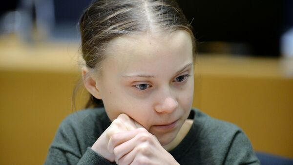 Swedish climate activist Greta Thunberg looks on before the meeting with EU environment ministers in Brussels, Belgium, March 5, 2020. - Sputnik International