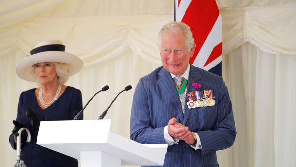Britain's Camilla, Duchess of Cornwall and Britain's Prince Charles, Prince of Wales attend a ceremony to present the Legion d'Honneur, France's highest distinction, to London for services during WW2 at Carlton Gardens in central London on June 18, 2020 - Sputnik International
