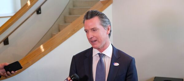 California's Governor Gavin Newsom speaks to the media after casting his vote at a voting center at The California Museum for the presidential primaries on Super Tuesday in Sacramento, CA, U.S., March 3, 2020. - Sputnik International