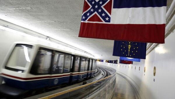 The Mississippi state flag, which incorporates the Confederate battle flag, hangs with other state flags in the subway system under the U.S. Capitol in Washington June 23, 2015. - Sputnik International