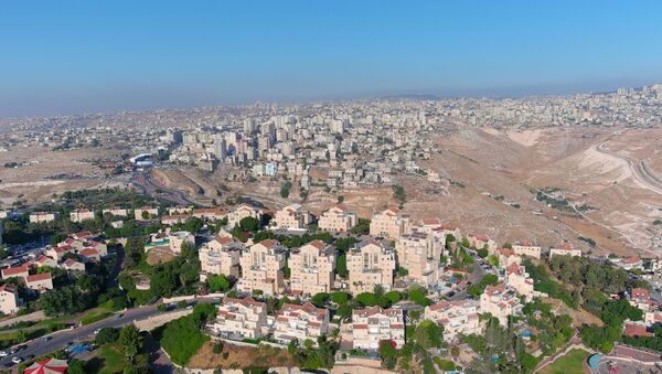 An aerial view shows the Jewish settlement of Maale Adumim in the Israeli-occupied West Bank, June 29, 2020. Picture taken with a drone.  - Sputnik International