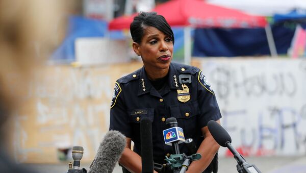 Seattle Police Chief Carmen Best holds a news conference inside the CHOP (Capitol Hill Organized Protest) area in front of the Seattle Police Department - East Precinct, hours after a fatal shooting as people occupy space in the aftermath of the death in Minneapolis police custody of George Floyd, in Seattle, Washington, U.S. June 29, 2020. - Sputnik International