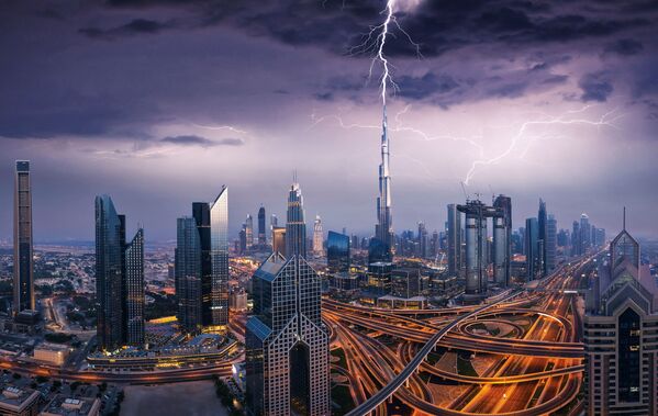 Dramatic Dubai sunset panoramic view of downtown with a lightning storm - Sputnik International