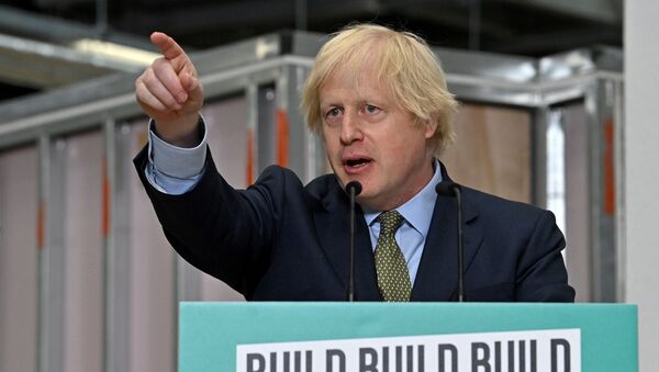 Britain's Prime Minister Boris Johnson gestures as he delivers a speech during his visit to Dudley College of Technology in Dudley, Britain, June 30, 2020. - Sputnik International