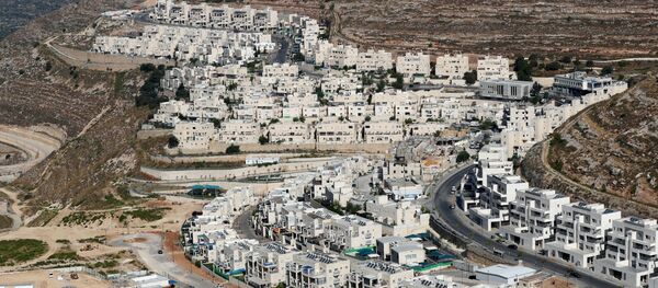 A view shows Israeli settlement buildings around Givat Zeev and Ramat Givat Zeev in the Israeli-occupied West Bank, near Jerusalem June 30, 2020 A view shows Israeli settlement buildings around Givat Zeev and Ramat Givat Zeev in the Israeli-occupied West Bank, near Jerusalem June 30, 2020 - Sputnik International